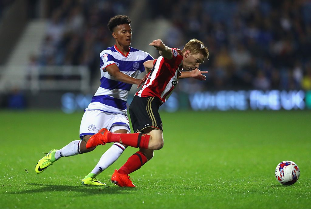 LONDON, ENGLAND - SEPTEMBER 21: Ducan Watmore of Sunderland is tackled by Nicholas Hamalainen of Queens Park Rangers during the EFL Cup Third Round match between Queens Park Rangers v Sunderland at Loftus Road on September 21, 2016 in London, England. (Photo by Warren Little/Getty Images)